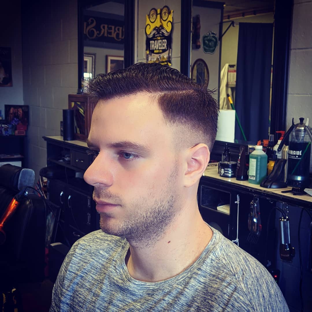 Client with a side-part fade at Gary's Barber Shop